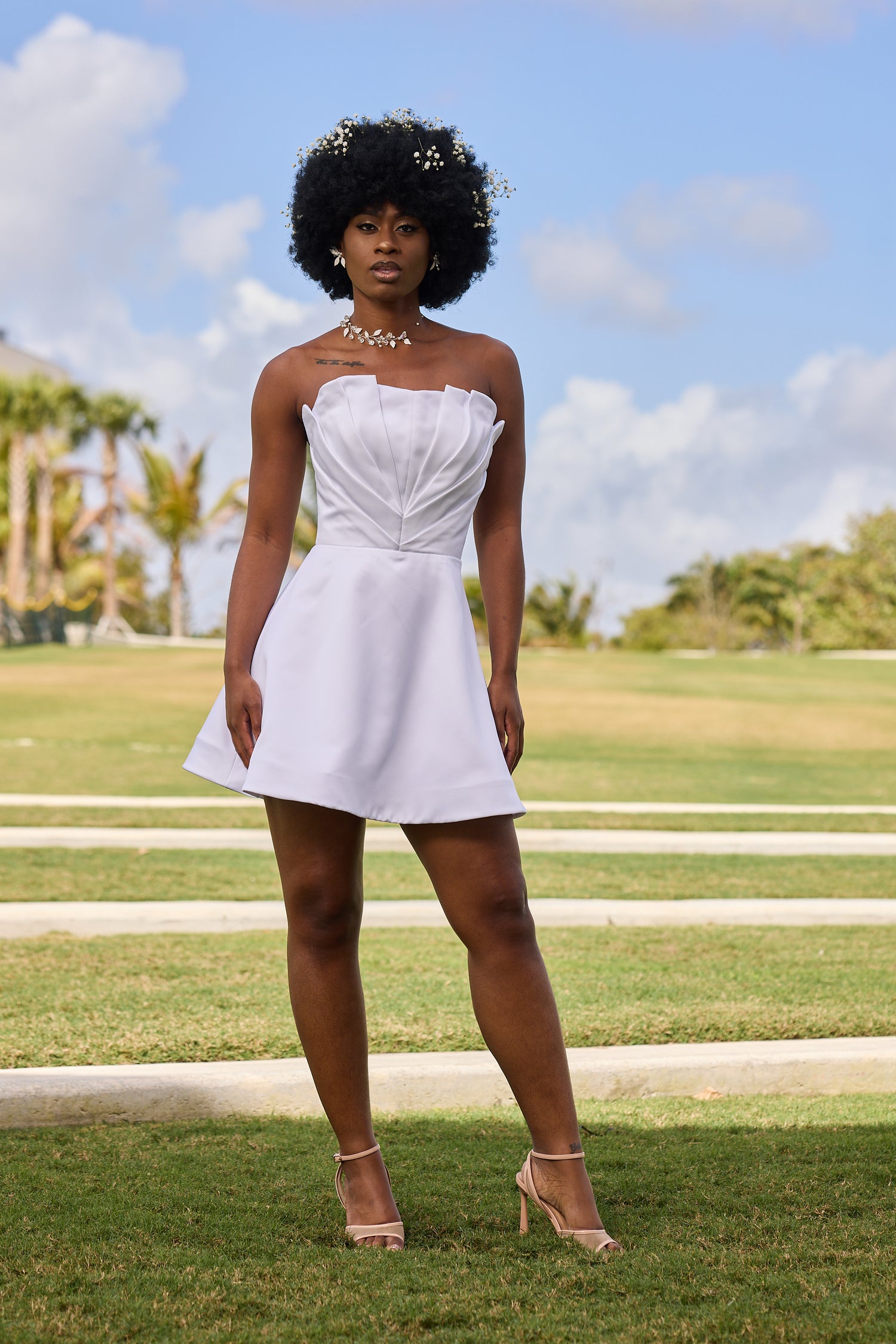 Woman in a white dress, design by Alexas