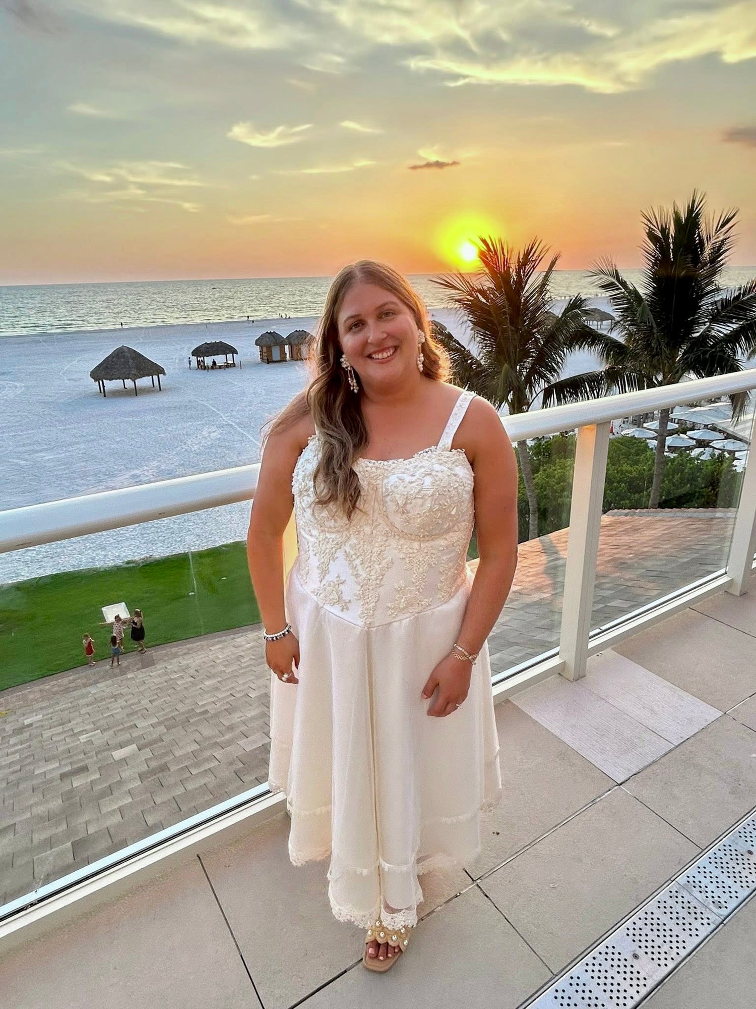 Woman in a white dress, design by Alexas